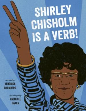 Shirley Chisholm is pictured with her blue and white patterned dress, holding up two fingers.